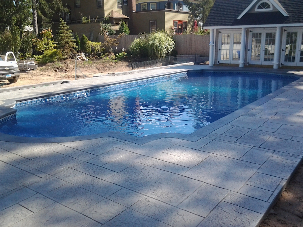 Swimming pool and stamped concrete project example 159